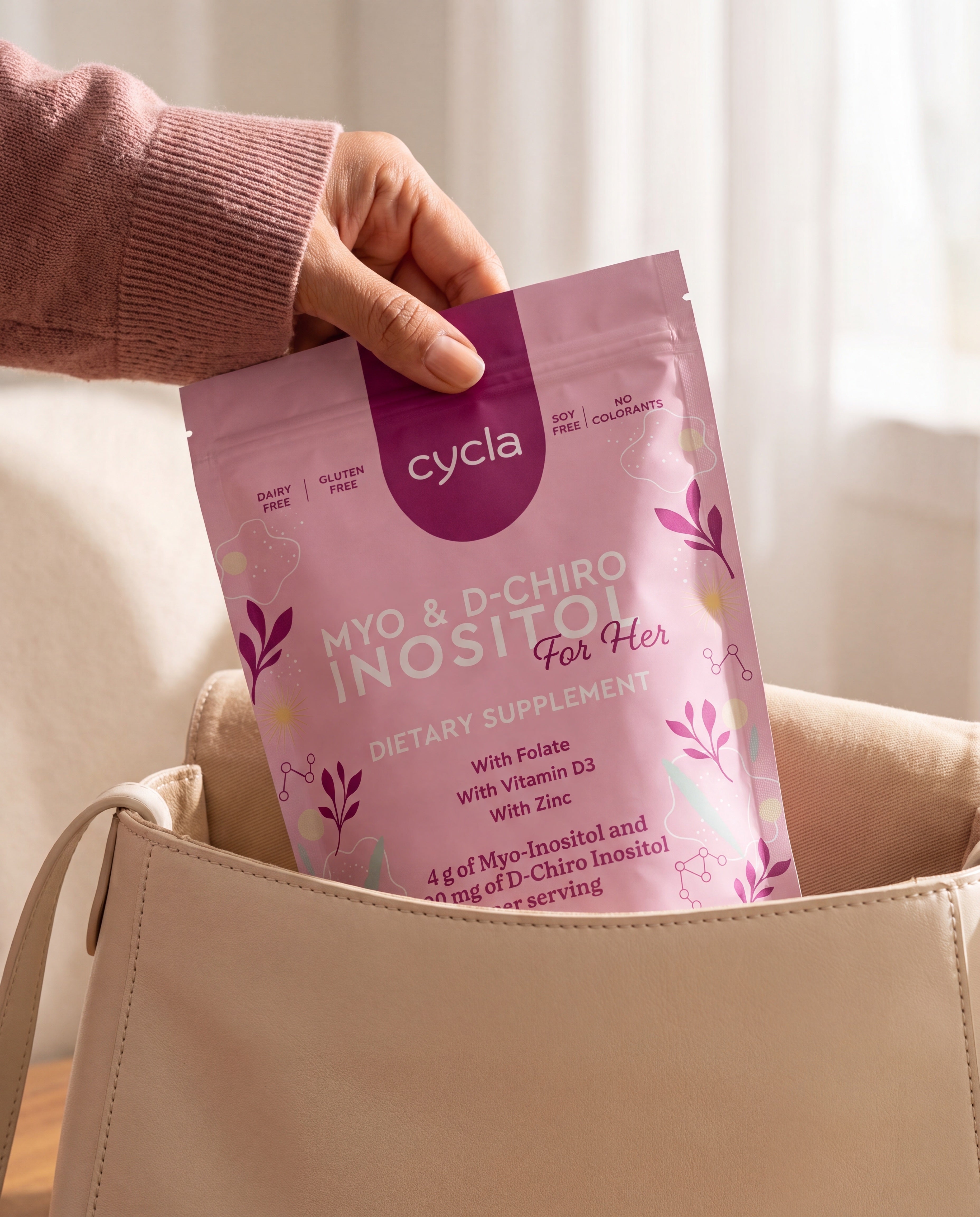 Cycla pouch being tucked into a handbag, on the go